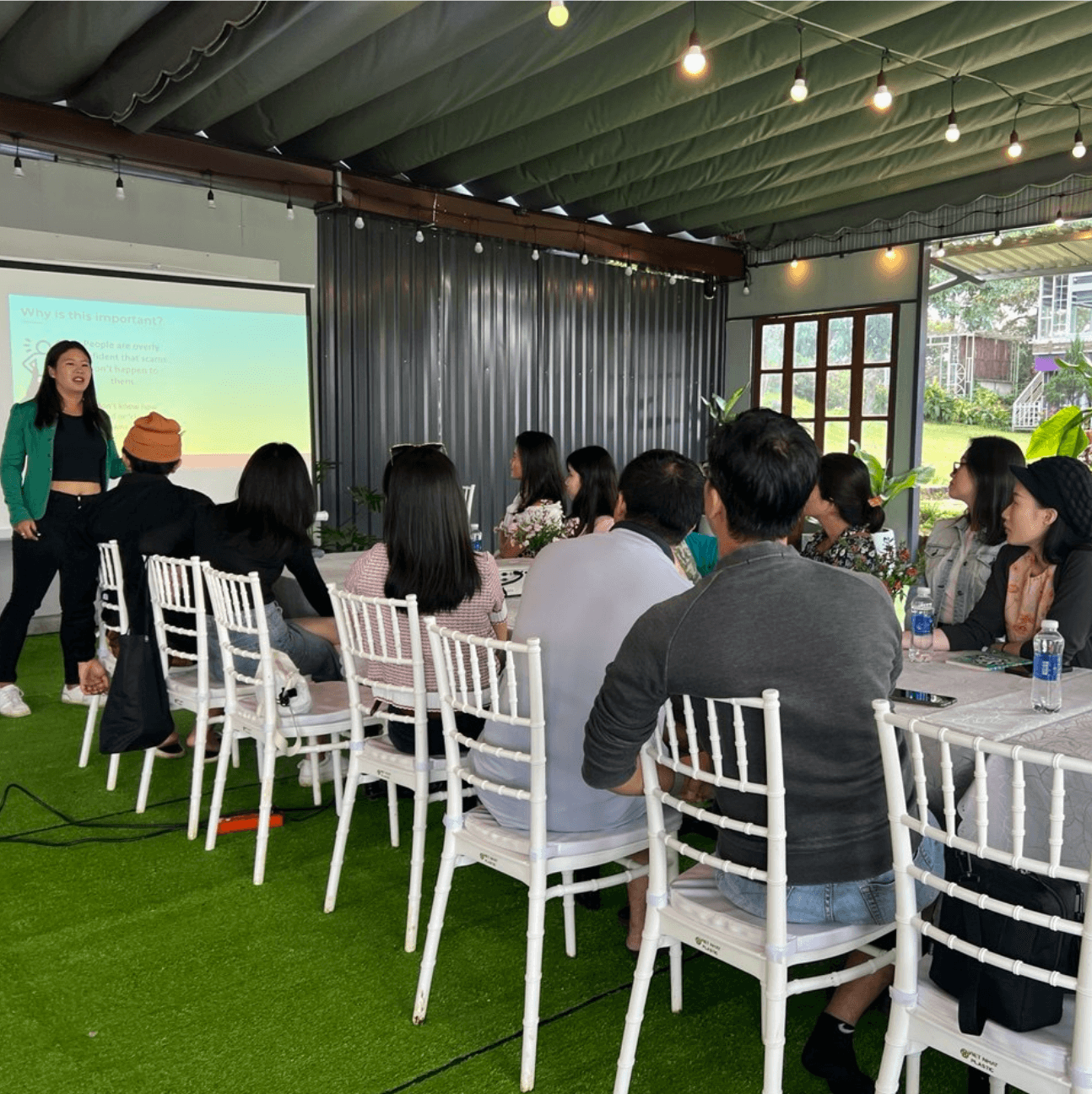 Professional presentation setup with microphone and laptop